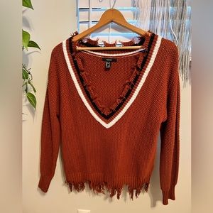 Woman’s size US:S. Forever 21 sweater.